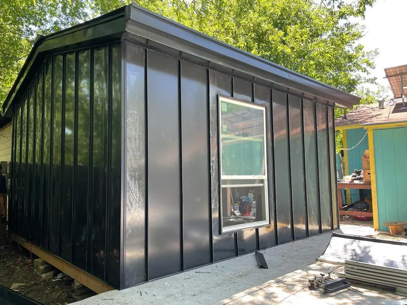 Black standing seam metal wall panels for Metal Roof Installation in Red Wing