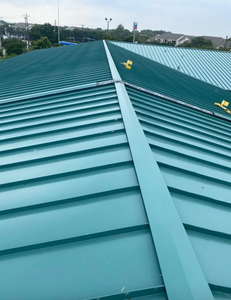 Green commercial metal roof ridge and valley for Metal Roof Repair in Red Wing